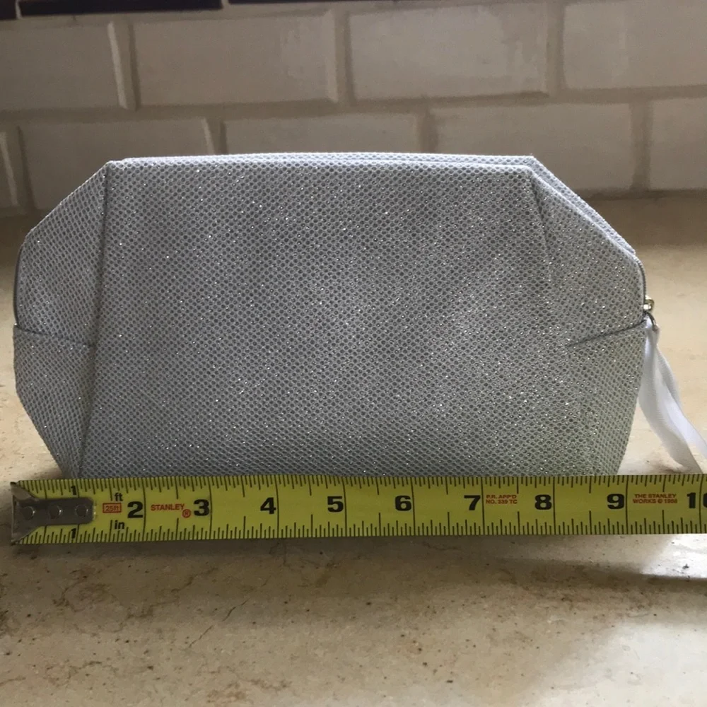 NWOT Orlane Paris silver sparkly lined bag
